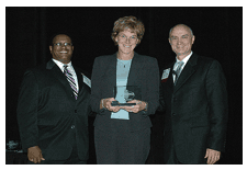 NJHMFA Director Marge DelVechia accepting the award. NJHMFA Director, Marge DelVechia accepting award.